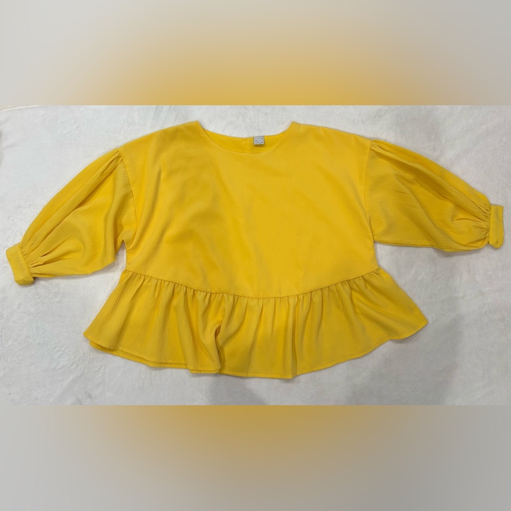 Yellow Ruffle Hem Blouse